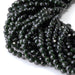 This is a Dakota Stones 4mm Green Goldstone Microfaceted Gemstone strand with round beads in 15-16 inch strand.
