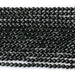 This is a Dakota Stones 4mm Green Goldstone Microfaceted Gemstone strand with round beads in 15-16 inch strand.