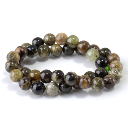 This is a Dakota Stones 10mm Green Garnet Gemstone strand with round beads in 15-16 inch strand.