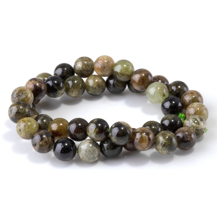 This is a Dakota Stones 10mm Green Garnet Gemstone strand with round beads in 15-16 inch strand.