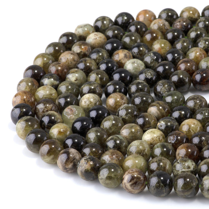 This is a Dakota Stones 10mm Green Garnet Gemstone strand with round beads in 15-16 inch strand.
