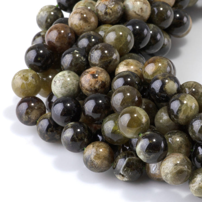This is a Dakota Stones 10mm Green Garnet Gemstone strand with round beads in 15-16 inch strand.