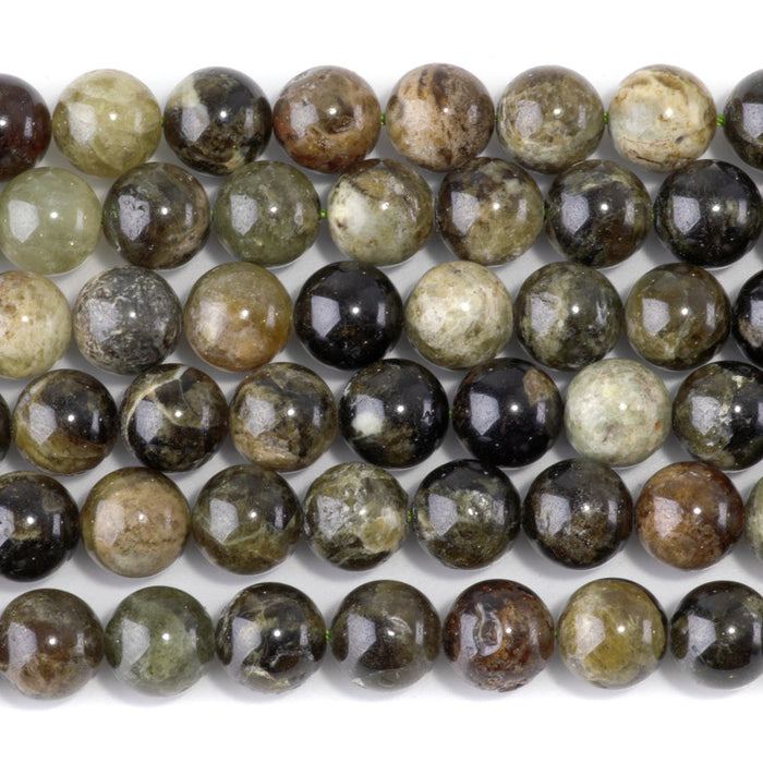 This is a Dakota Stones 10mm Green Garnet Gemstone strand with round beads in 15-16 inch strand.