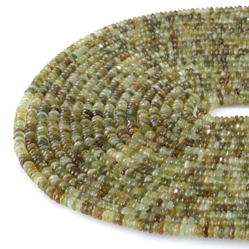 This is a Dakota Stones 2x4mm Green Garnet Gemstone strand with AAA grade faceted rondelle beads in 15-16 inch strand.