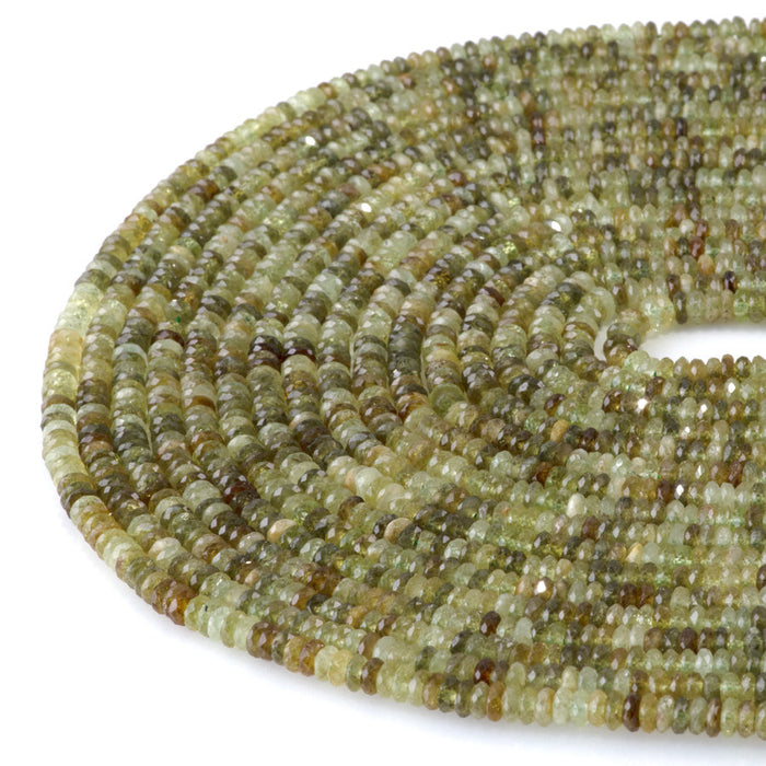 This is a Dakota Stones 2x4mm Green Garnet Gemstone strand with AAA grade faceted rondelle beads in 15-16 inch strand.
