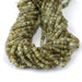 This is a Dakota Stones 2x4mm Green Garnet Gemstone strand with AAA grade faceted rondelle beads in 15-16 inch strand.