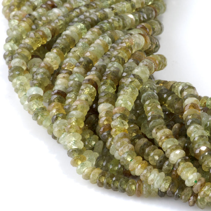 This is a Dakota Stones 2x4mm Green Garnet Gemstone strand with AAA grade faceted rondelle beads in 15-16 inch strand.