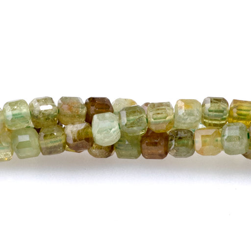 This is a Dakota Stones 3mm Green Garnet Gemstone strand with A grade table-cut cube beads in 15-16 inch strand.