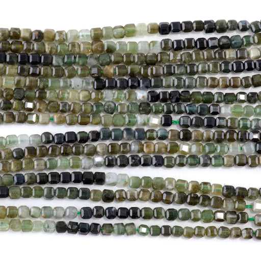 This is a Dakota Stones 3mm Green Garnet Banded Gemstone strand with A grade table-cut cube beads in 15-16 inch strand.