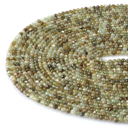 This is a Dakota Stones 3mm Green Garnet Gemstone strand with faceted round beads in 15-16 inch strand.