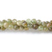 This is a Dakota Stones 3mm Green Garnet Gemstone strand with faceted round beads in 15-16 inch strand.