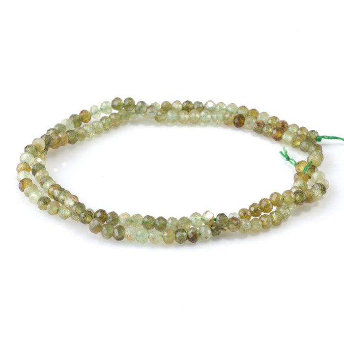 This is a Dakota Stones 3x4mm Green Garnet Gemstone strand with faceted rondelle beads in 15-16 inch strand.