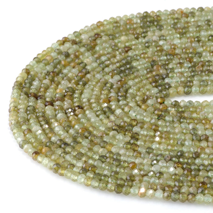 This is a Dakota Stones 3x4mm Green Garnet Gemstone strand with faceted rondelle beads in 15-16 inch strand.