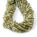 This is a Dakota Stones 3x4mm Green Garnet Gemstone strand with faceted rondelle beads in 15-16 inch strand.