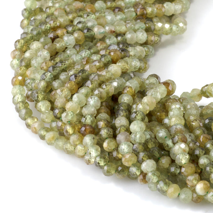 This is a Dakota Stones 3x4mm Green Garnet Gemstone strand with faceted rondelle beads in 15-16 inch strand.