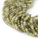 This is a Dakota Stones 3x4mm Green Garnet Gemstone strand with faceted rondelle beads in 15-16 inch strand.