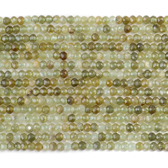 This is a Dakota Stones 3x4mm Green Garnet Gemstone strand with faceted rondelle beads in 15-16 inch strand.