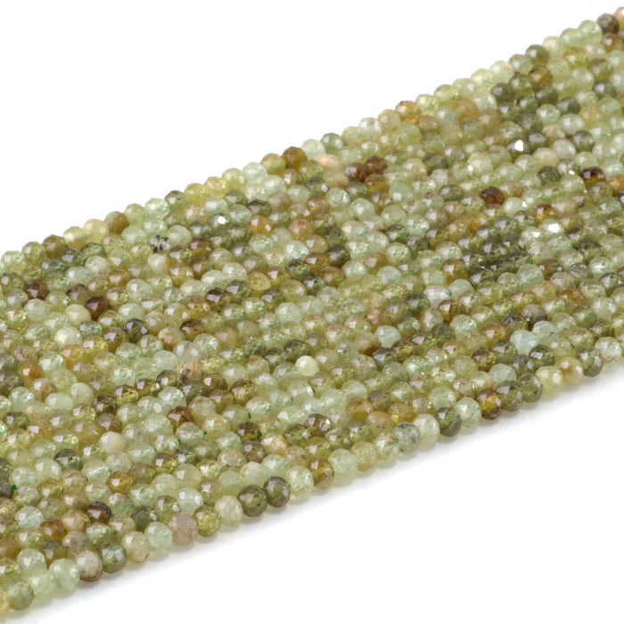 This is a Dakota Stones 3x4mm Green Garnet Gemstone strand with faceted rondelle beads in 15-16 inch strand.
