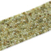 This is a Dakota Stones 3x4mm Green Garnet Gemstone strand with faceted rondelle beads in 15-16 inch strand.