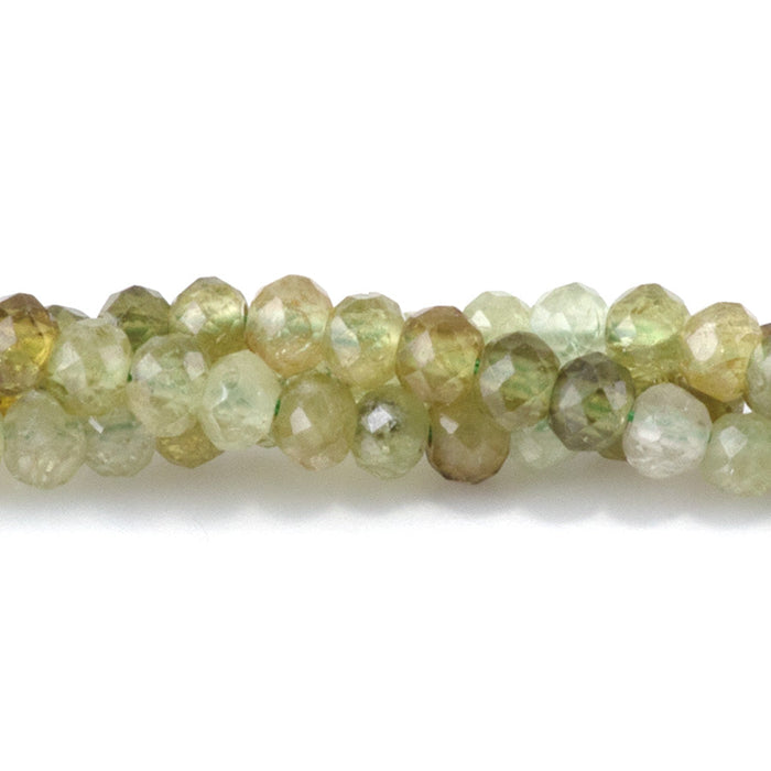 This is a Dakota Stones 3x4mm Green Garnet Gemstone strand with faceted rondelle beads in 15-16 inch strand.
