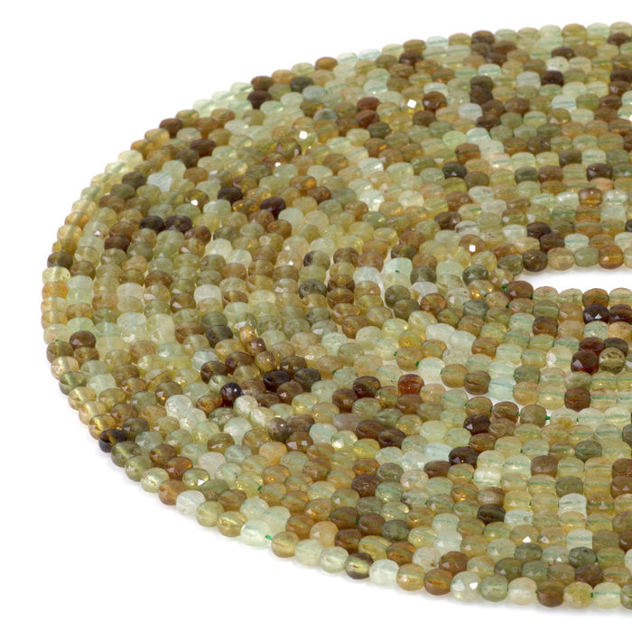 This is a Dakota Stones 4mm Green Garnet Gemstone strand with faceted coin beads in 15-16 inch strand.