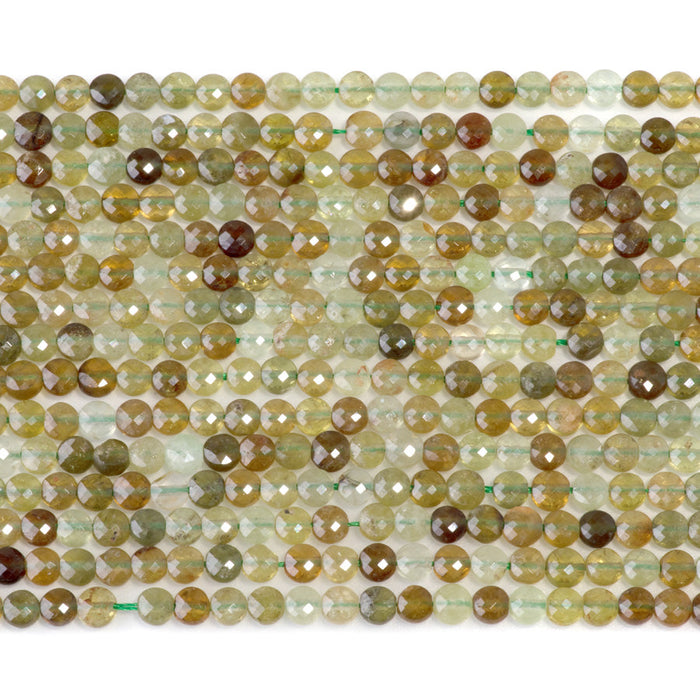 This is a Dakota Stones 4mm Green Garnet Gemstone strand with faceted coin beads in 15-16 inch strand.