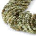 This is a Dakota Stones 4mm Green Garnet Microfaceted Gemstone strand with round beads in 15-16 inch strand.