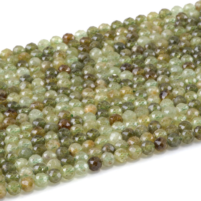 This is a Dakota Stones 4mm Green Garnet Microfaceted Gemstone strand with round beads in 15-16 inch strand.