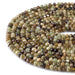 This is a Dakota Stones 4x6mm Green Garnet Gemstone strand with faceted rondelle beads in 15-16 inch strand.