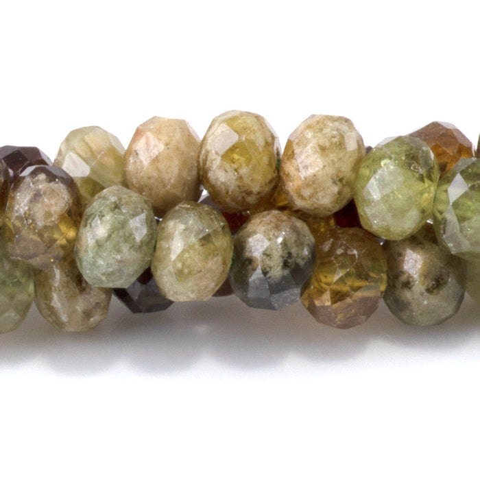 This is a Dakota Stones 4x6mm Green Garnet Gemstone strand with faceted rondelle beads in 15-16 inch strand.