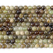This is a Dakota Stones 6mm Green Garnet Gemstone strand with round beads in 15-16 inch strand.
