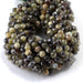 This is a Dakota Stones 6mm Green Garnet Gemstone strand with double heart faceted round beads in 15-16 inch strand.