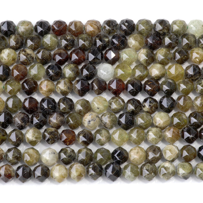 This is a Dakota Stones 6mm Green Garnet Gemstone strand with double heart faceted round beads in 15-16 inch strand.