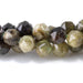 This is a Dakota Stones 6mm Green Garnet Gemstone strand with double heart faceted round beads in 15-16 inch strand.