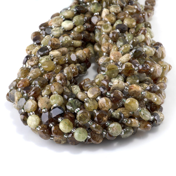 This is a Dakota Stones 8mm Green Garnet Gemstone strand with star cut faceted coin beads in 15-16 inch strand.