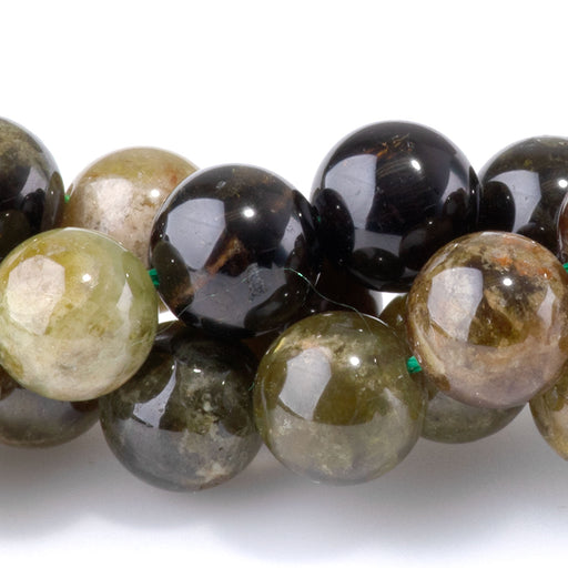 This is a Dakota Stones 8mm Green Garnet Banded Gemstone strand with round beads in 15-16 inch strand.