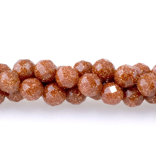 This is a Dakota Stones 4mm Goldstone Microfaceted Gemstone strand with round beads in 15-16 inch strand.