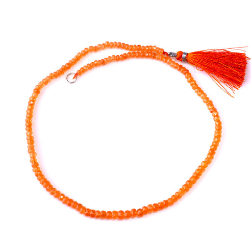 This is a Dakota Stones 4-6mm Mandarin Garnet Gemstone strand with faceted rondelle beads in 15-16 inch strand.