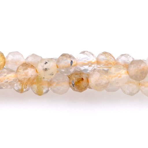 This is a Dakota Stones 4mm Gold Rutilated Quartz Gemstone strand with round beads in 15-16 inch strand.