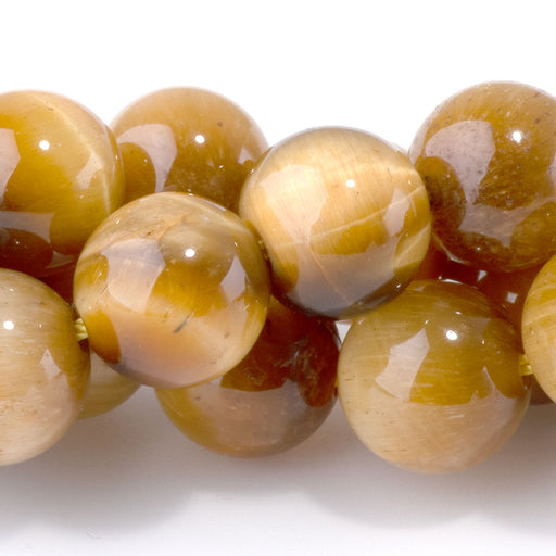 This is a Dakota Stones 10mm Golden Tiger Eye Gemstone strand with round beads in 15-16 inch strand.