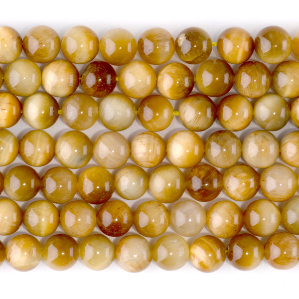 This is a Dakota Stones 8mm Golden Tiger Eye Gemstone strand with round beads in 15-16 inch strand.