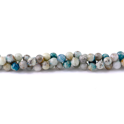This is a Dakota Stones 8mm Hackamite Gemstone strand with round beads in 15-16 inch strand.