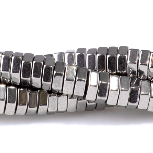 This is a Dakota Stones Hematite Antique Silver Plated Hexagon Gemstone strand of round beads in 15-16 inch strand.
