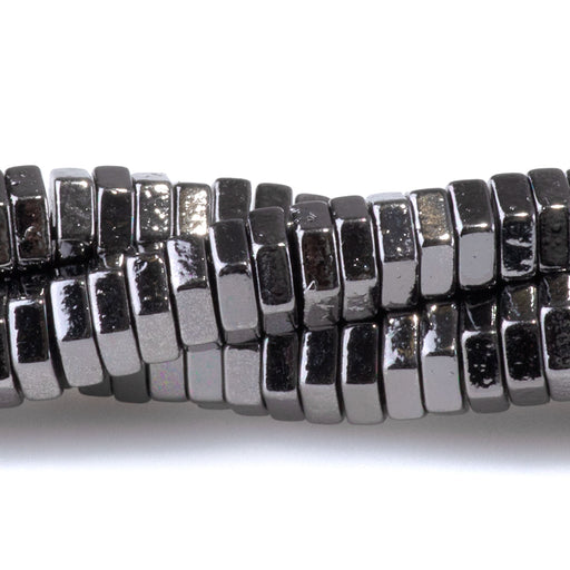 This is a Dakota Stones Hematite Black Plated Hexagon Gemstone strand of round beads in 15-16 inch strand.