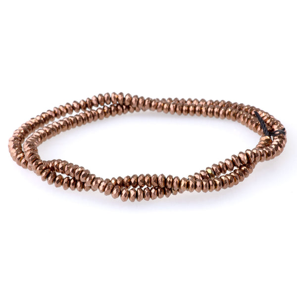 This is a Dakota Stones 4mm Hematite Copper Plated Gemstone strand with faceted rondelle beads in 15-16 inch strand.