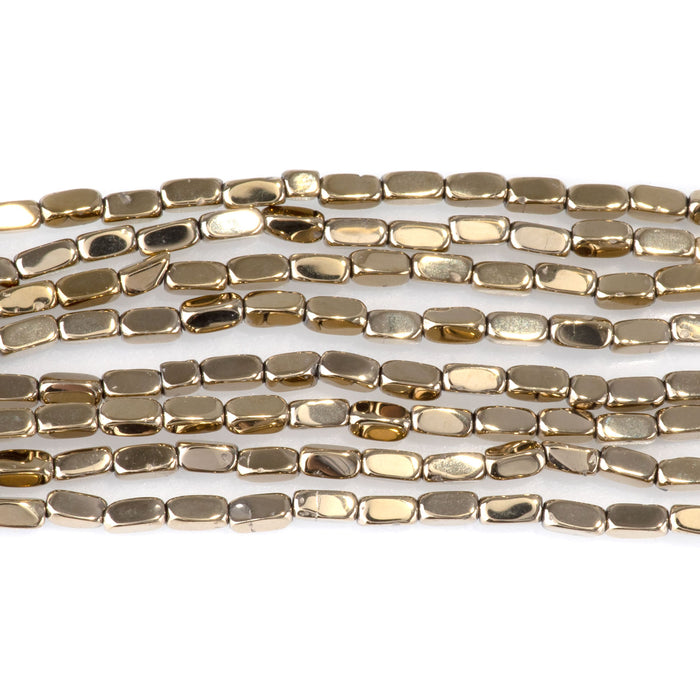 This is a Dakota Stones 2x4mm Hematite Pyrite Plated Corner Cut Gemstone strand with nugget beads in 15-16 inch strand.
