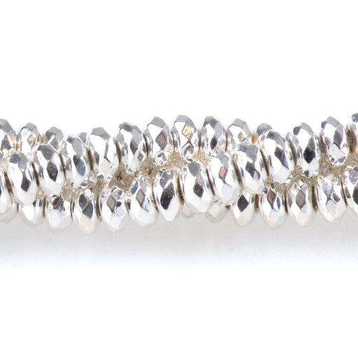 This is a Dakota Stones 4mm Hematite White Silver Plated Gemstone strand with faceted rondelle beads in 15-16 inch strand.