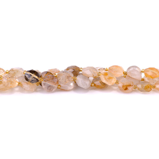 This is a Dakota Stones 12mm Copper Hematoid Quartz Cut Gemstone strand with coin star beads in 15-16 inch strand.