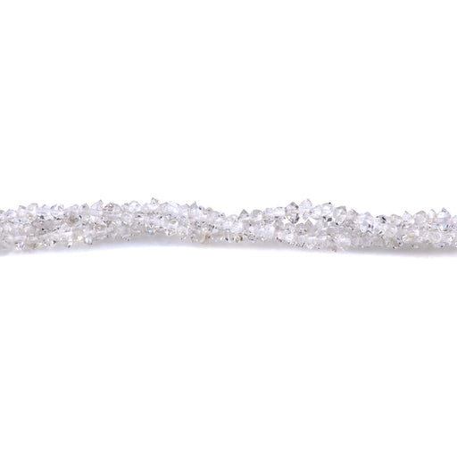 This is a Dakota Stones 2x4-3x6mm Herkimer Quartz Drill Point Gemstone strand of round beads in 15-16 inch strand.