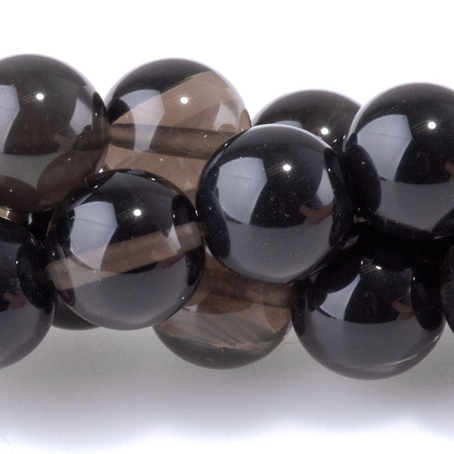 This is a Dakota Stones 10mm Ice Obsidian Gemstone strand with round beads in 8 inch strand.